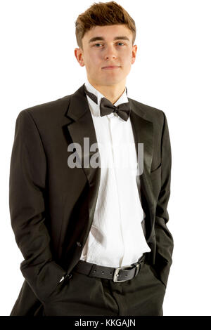 18 year old wearing a tuxedo isolated on a white background Stock Photo