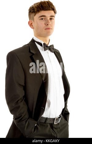 18 year old wearing a tuxedo isolated on a white background Stock Photo