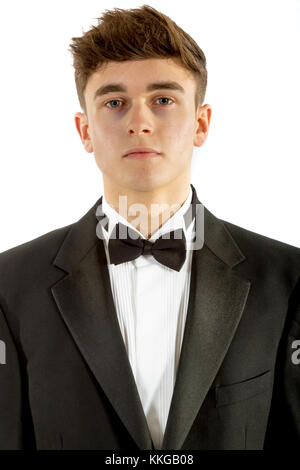 18 year old wearing a tuxedo isolated on a white background Stock Photo