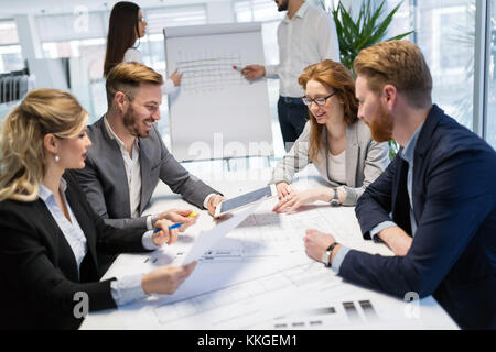 Team of architects working together on project Stock Photo