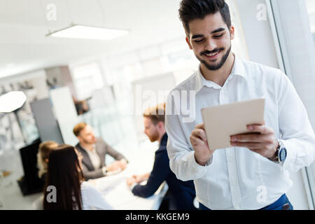 Young male architect using digital tablet in office Stock Photo