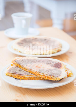 Bolo levedo, typical bread from Vale das Furnas in Azores, grilled with ...