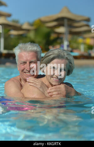 couple relaxing in  pool Stock Photo