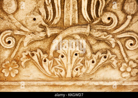 Detail of ancient greek column with floral pattern close-up Stock Photo