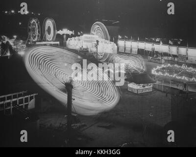 Digital photograph of a large-format print of the Nebraska State Fair, Lincoln, Nebraska in 1950.  photograph had mailing label attached stating  Ralph Fox 1601 Euclid Ave. Lincoln 2, Nebr. Nebraska State Fair rides, 1950 Stock Photo