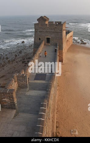 Qinhuangda, Qinhuangda, China. 30th Nov, 2017. Qinhuangdao, CHINA-November 2017:(EDITORIAL USE ONLY. CHINA OUT) .Laolongtou Great Wall, located at Shanhaiguan Scenic Area in Qinhuangdao, north China's Hebei Province, is also known as Old Dragon's Head Great Wall. Laolongtou is where the Great Wall of China meets the sea and was once considered as where the Great Wall of China starts. Laolongtou means Old Dragon'ss Head, so named because the Great Wall here resembles a dragon drinking water from the sea. Laolongtou is the only section of the great wall that extends into the sea. (Credit I Stock Photo