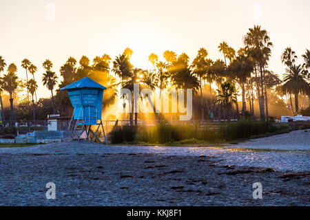 Silhouettes of palm trees at sunset, Santa Barbara beach, Southern California, USA Stock Photo