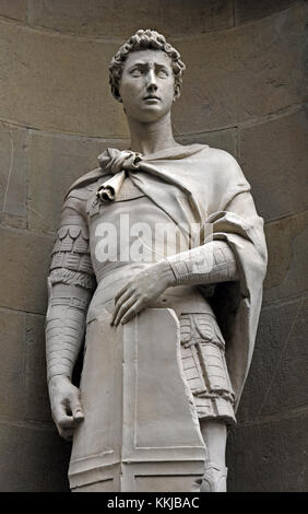 Saint George (Guild of Armourers and Swordmakers) 1417 by Donatello facade of the Orsanmichele ( or Kitchen Garden of St. Michael ) is a church in Florence ( In 1336 as a market and grain storage area, as on commission of the Silk guild (silk union). Florence Italy . Stock Photo