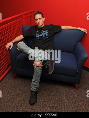 FORT LAUDERDALE, FL - NOVEMBER 10: G Easy poses for a portrait at Radio Station Y-100 on November 10, 2015 in Fort Lauderdale, Florida.   People:  G Easy Stock Photo
