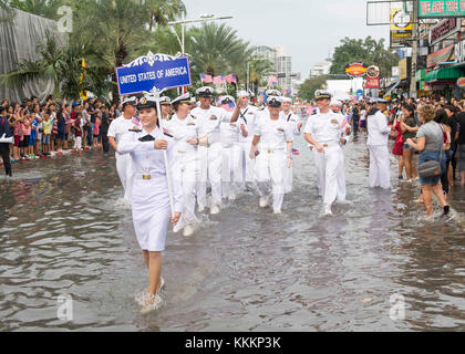 171119-N-YR245-345  PATTAYA CITY, Thailand (Nov. 19, 2017) Sailors from the Arleigh Burke-class guided-missile destroyer USS Pinckney (DDG 91) walk in a parade during the 50th anniversary celebration of the Association of Southeast Asian Nations (ASEAN) in Pattaya City, Thailand. Pinckney is part of the Nimitz Carrier Strike Group on a regularly scheduled deployment in the U.S. 7th Fleet area of responsibility in support of maritime security operations and theater security cooperation efforts. (U.S. Navy photo by Mass Communication Specialist 2nd Class Craig Z. Rodarte/Released) Stock Photo