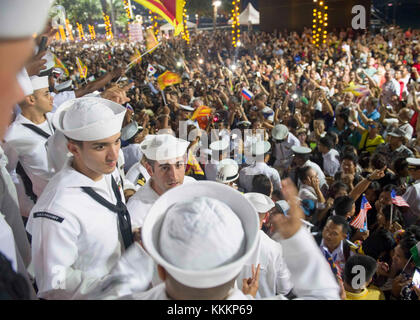 171119-N-YR245-481  PATTAYA CITY, Thailand (Nov. 19, 2017) Sailors from the Arleigh Burke-class guided-missile destroyer USS Pinckney (DDG 91) walk in a parade during the 50th anniversary celebration of the Association of Southeast Asian Nations (ASEAN) in Pattaya City, Thailand. Pinckney is part of the Nimitz Carrier Strike Group on a regularly scheduled deployment in the U.S. 7th Fleet area of responsibility in support of maritime security operations and theater security cooperation efforts. (U.S. Navy photo by Mass Communication Specialist 2nd Class Craig Z. Rodarte/Released) Stock Photo