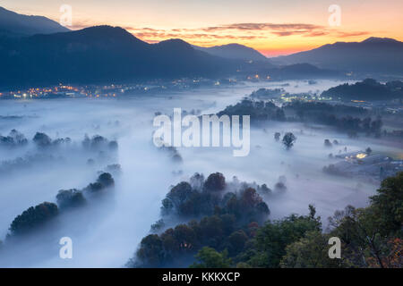 Mist over Adda river seen from Airuno at the Santuario Madonna della Rocchetta, Airuno, Parco dell'Adda Nord, Lecco province, Brianza, Lombardy, Italy Stock Photo