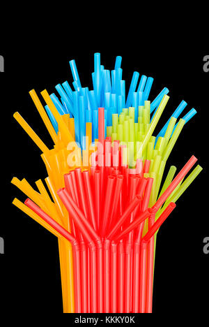 set of multicolored straws on a black background Stock Photo