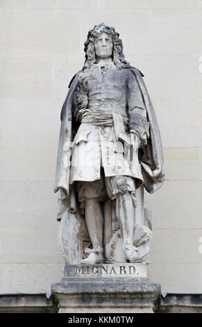 Paris, France. Palais du Louvre. Statue in the Cour Napoleon: Pierre Mignard I (1612 – 1695), French painter, 'Mignard le Romain' to distinguish him.. Stock Photo