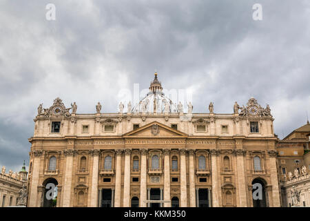 Looking up at the front of St Peter's Basilica, Vatican City, Rome, Lazio, Italy, Europe. Stock Photo