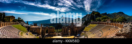 A panoramic view of the Ancient Theatre in Taormina, Sicily. Its position is unique as it overlooks both the Mediterranean sea and Etna Volcano Stock Photo