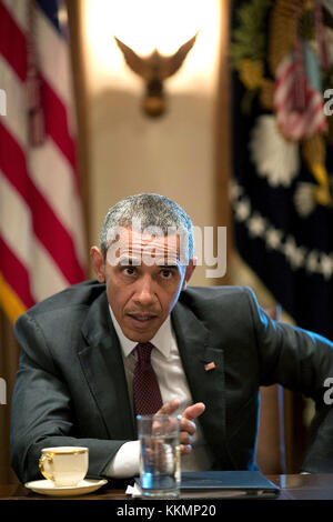 August 4, 2015 'The President reacts to a comment during a meeting in the Cabinet Room with American Jewish community leaders to discuss the Iran nuclear agreement.' (Official White House Photo by Pete Souza) This official White House photograph is being made available only for publication by news organizations and/or for personal use printing by the subject(s) of the photograph. The photograph may not be manipulated in any way and may not be used in commercial or political materials, advertisements, emails, products, promotions that in any way suggests approval or endorsement of the President Stock Photo