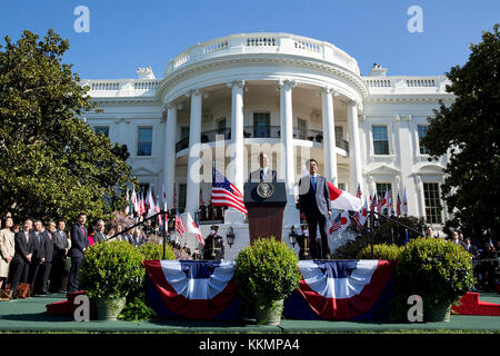 President Barack Obama delivers remarks during the State Arrival ceremony for Prime Minister Shinzo Abe of Japan on the South Lawn of the White House, April 28, 2015.(Official White House Photo by Pete Souza)  This official White House photograph is being made available only for publication by news organizations and/or for personal use printing by the subject(s) of the photograph. The photograph may not be manipulated in any way and may not be used in commercial or political materials, advertisements, emails, products, promotions that in any way suggests approval or endorsement of the Presiden Stock Photo