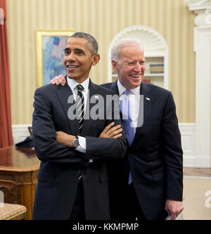 President Barack Obama jokes with Vice President Joe Biden in the Oval Office, Feb. 9, 2015. (Official White House Photo by Pete Souza)  This official White House photograph is being made available only for publication by news organizations and/or for personal use printing by the subject(s) of the photograph. The photograph may not be manipulated in any way and may not be used in commercial or political materials, advertisements, emails, products, promotions that in any way suggests approval or endorsement of the President, the First Family, or the White House Stock Photo