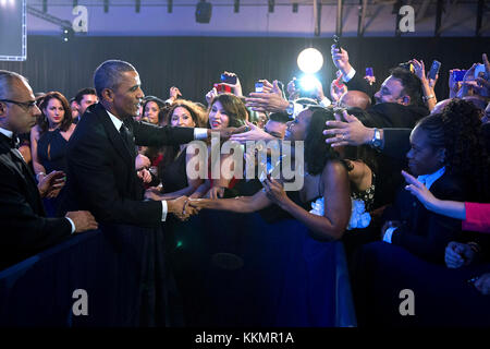 President Barack Obama greets audience members at the Congressional Hispanic Caucus Institute's 37th Annual Awards Gala dinner at the Walter E. Washington Convention Center in Washington, D.C., Oct. 2, 2014. Stock Photo