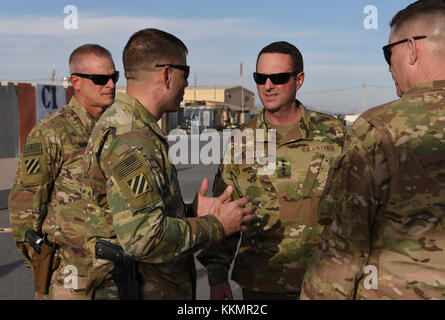 U.S. Army Soldiers with Task Force Marauder were presented with coins from U.S. Air Force Gen. Joseph Lengyel, Chief, National Guard Bureau, Nov. 23, 2017 in Afghanistan for their recent actions in response to a mass casualty involving U.S. Soldiers. Lengyel recognized Soldiers with Detachment 1, C Company, Medical Evacuation, 2-211th General Support Aviation Battalion (GSAB) with the Iowa National Guard and C Company, 4-3 Assault Helicopter Battalion (AHB), 3rd Combat Aviation Brigade, who responded to a vehicle borne improvised explosive device strike against an American convoy Nov. 13, 2017 Stock Photo