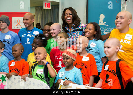 First Lady Michelle Obama joins children for a group photo during a visit to St. Jude Children's Research Hospital in Memphis, Tenn., Sept. 17, 2014. Stock Photo