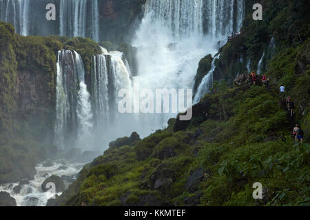 Tourists on track by Iguazu Falls, Argentina, South America Stock Photo