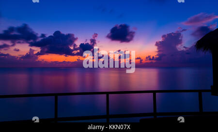 Gorgeous dusk in Maldives. Shot is from the deck of an over water bungalow. Stock Photo
