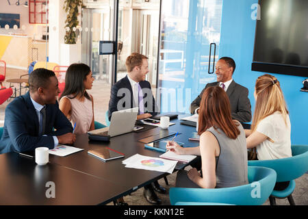 Young professional colleagues at a business meeting Stock Photo