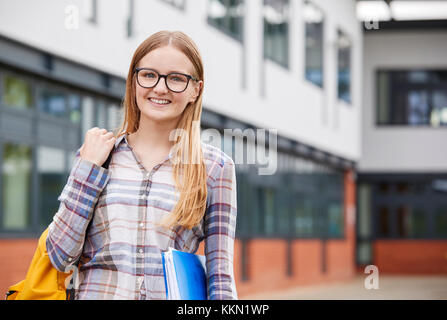 Portrait Of Female Student Standing Outside College Building Stock Photo