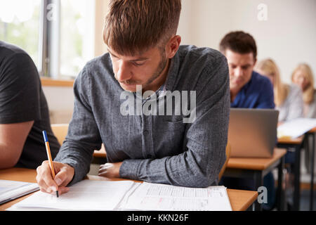 Mature Male Student Attending Adult Education Class Stock Photo