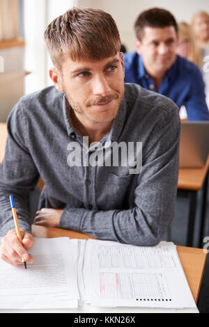 Mature Male Student Attending Adult Education Class Stock Photo