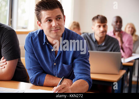 Mature Male Student Attending Adult Education Class Stock Photo