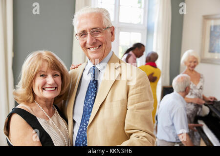 Portrait Of Senior Couple Enjoying Dancing Club Together Stock Photo