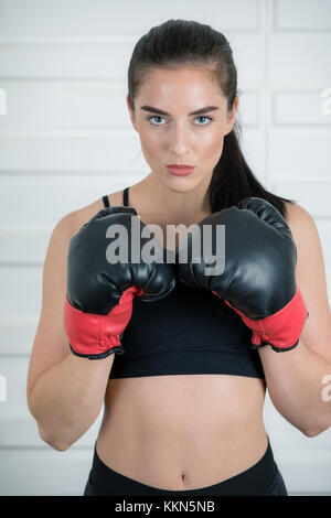 Melissa, is a fitness model and fitness trainer using free weights to ...