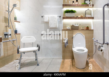 Interior of bathroom for the disabled or elderly people. Handrail for disabled and elderly people in the bathroom Stock Photo