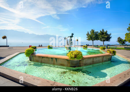 Beautiful fountain on seafront in Vevey town. Lake Geneva, Vaud canton, Switzerland Stock Photo