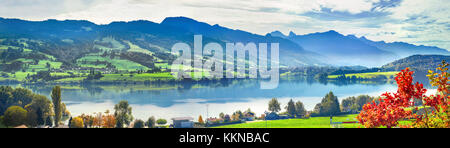 Panoramic landscape of lake Gruyere in Switzerland. Canton Fribourg, Switzerland Stock Photo