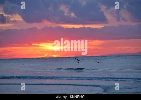 Brilliant Awe Inspiring Sunrise over the Ocean Stock Photo