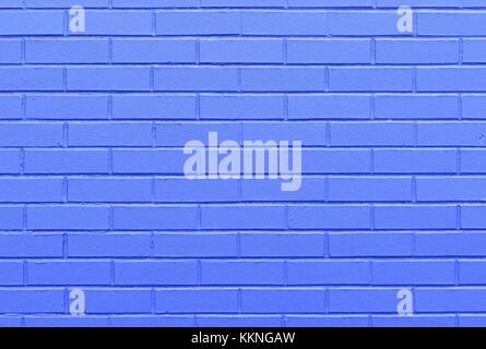 Brick Wall Background painted bright a blue color Stock Photo