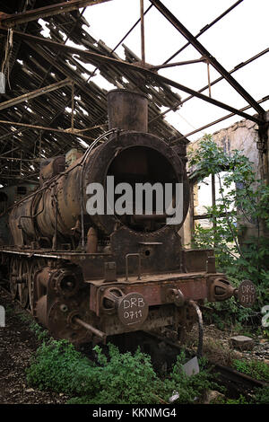 A rusty, abandoned steam train in Tripoli, Lebanon. Stock Photo