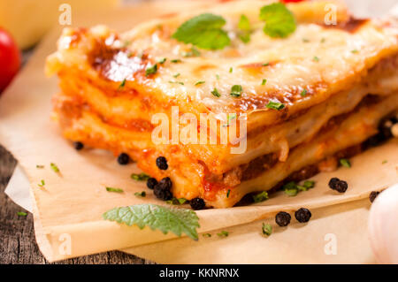 Juicy homemade lasagna with beef meat.Selective focus in the middle of lasagna Stock Photo