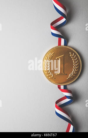 Gold first place winners medal. Success achievement concept Stock Photo