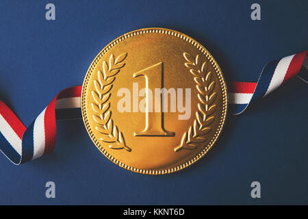 Gold first place winners medal. Success achievement concept Stock Photo