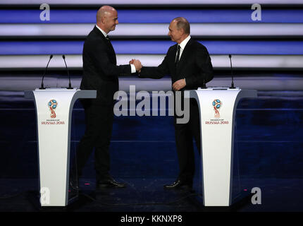 Russian president Vladimir Putin (right) shakes the hand of FIFA President Gianni Infantino during the FIFA 2018 World Cup draw at The Kremlin, Moscow. PRESS ASSOCIATION Photo Picture date: Friday December 1, 2017. See PA story SOCCER World Cup. Photo credit should read: Nick Potts/PA Wire. Stock Photo