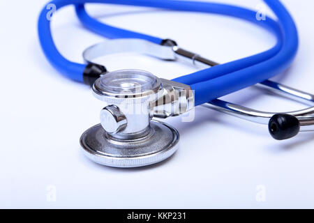 https://l450v.alamy.com/450v/kkp231/medical-stethoscope-head-lying-on-blue-doctor-uniform-closeup-medical-kkp231.jpg