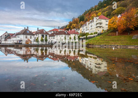 Bergen, Norway -  October 2017 :  Small lake reflection of the residential houses on the hillside in the old part of Bergen town, Norway Stock Photo