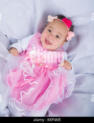 portrait of a cute newborn baby girl in a pink dress Stock Photo Alamy