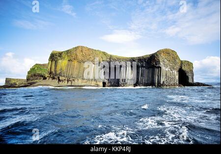 Basalt rock columns of the island of Staffa, Inner Hebrides, Scotland. Entrance to Fingal's Cave on right side
