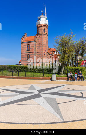 Rose of the Winds on a square in front of Lighthouse in Ustka town over Baltic Sea, Pomeranian Voivodeship of Poland Stock Photo